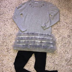 Tunic and black leggings